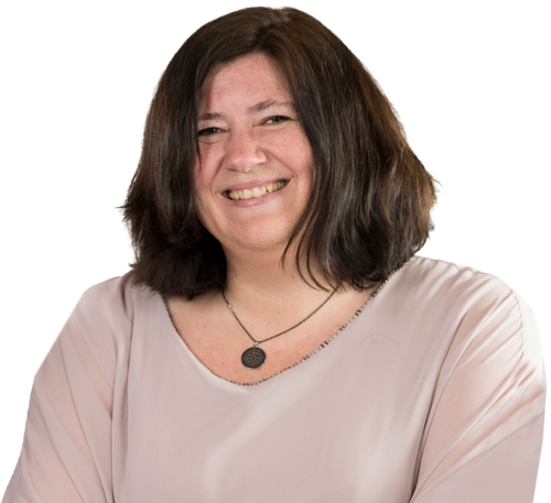 Portrait von Heike Schilling, sie trägt eine helle Bluse und eine Kette.