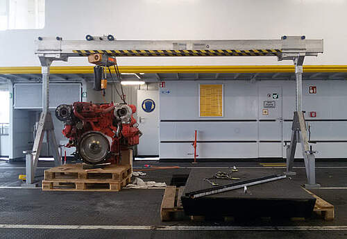 Ship's engine on aluminium gantry crane